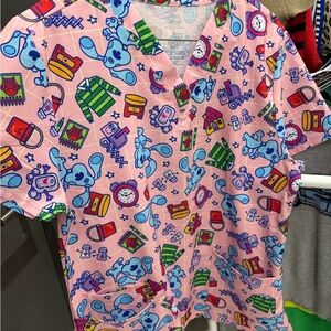 Fashion Nova Pink Cartoon Print scrub Top